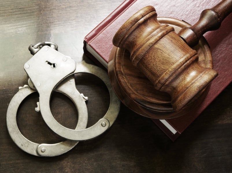 criminal lawyers in Charlotte nc handcuffs and gavel